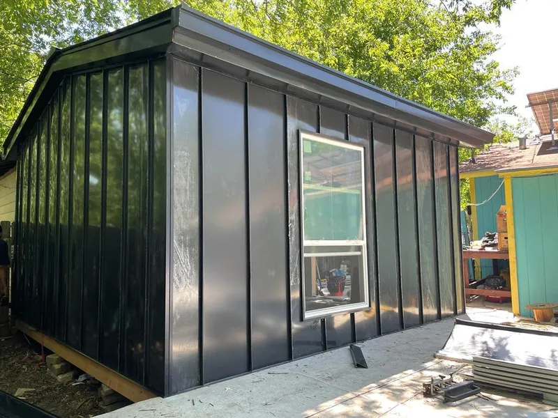 Black standing seam metal wall panels for Roof Inspection in Watsonville